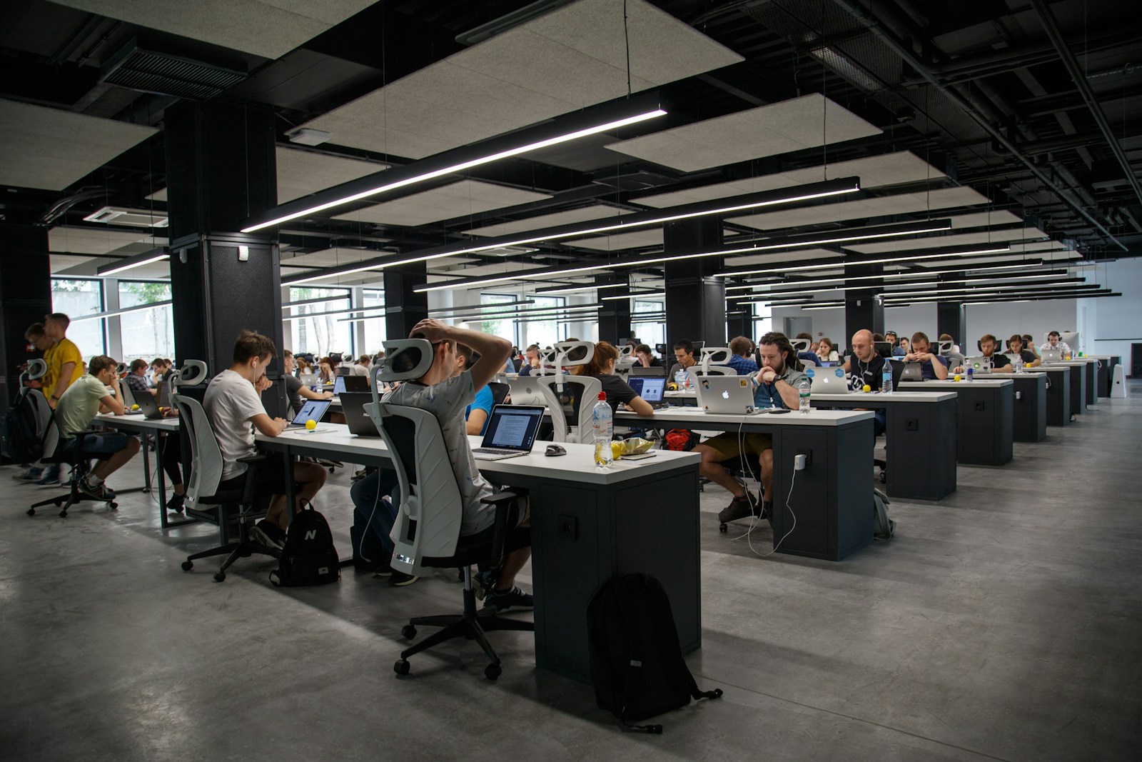 Cyberwatch360 team members collaborating in a modern office